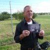 Gordon Morton with photo of father